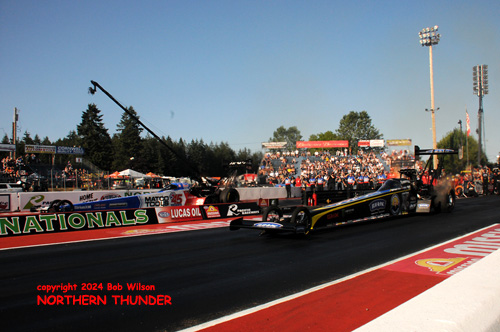 Brittany Force (near lane) vs Antron Brown (far lane)